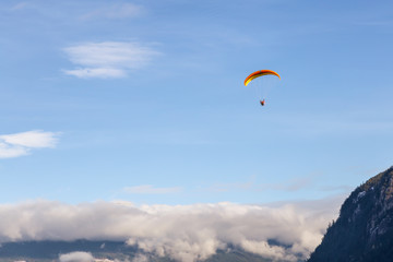 Paraglider flying in Squamish, British Columbia, Canada.