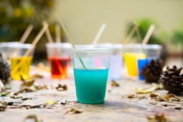 Epoxy resin in cup for casting Stabilizing wood and pine cone hybrid