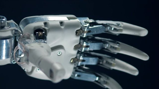 Modern prosthesis works, bionic hand moving.