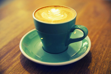 Coffee cup on wooden table