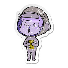 distressed sticker of a happy cartoon astronaut