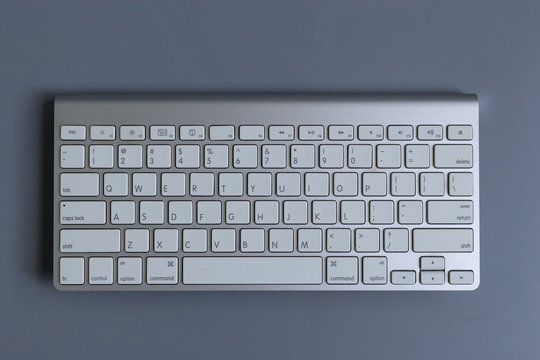 Top view image of Wireless keyboard on gray background