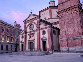 Fototapeta na wymiar The church of San Magno in piazza San Magno (square San Magno) at sunset in Legnano, Milan, Lombardy, Italy