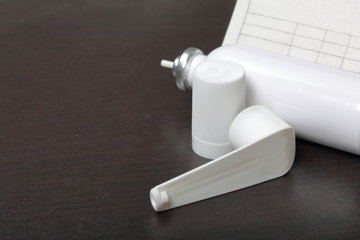 Inhaler for the treatment of respiratory organs. Spray can and cap white. Next recipe to buy. On a...