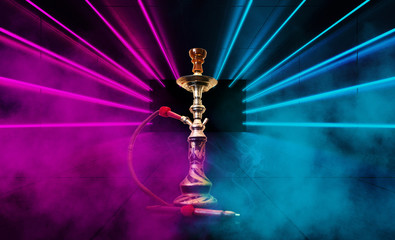 Smoke hookah dark, blue grunge background. Concrete covering, tile. Neon light, smoke, smog