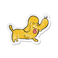 retro distressed sticker of a cartoon happy dog