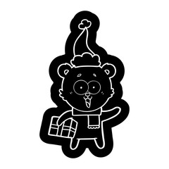 laughing teddy  bear with christmas present wearing santa hat