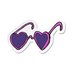 sticker of a cartoon heart sunglasses
