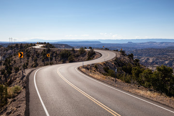 Scenic road in the desert during a vibrant sunny day. Taken on Route 12, Utah, United States of America.