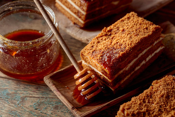 Layered honey cake with cream.