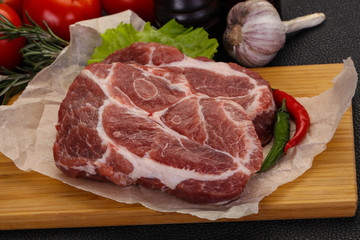 Raw pork neck steak