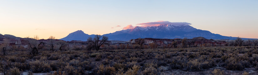Beautiful American Landscape during a vibrant sunny sunrise. Taken near Hanksville, Utah, United States of America.