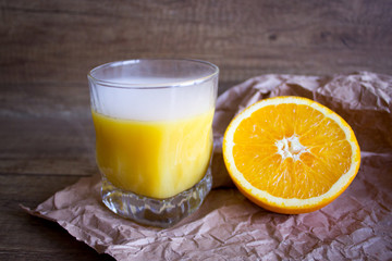 Orange juice, summer cocktail with orange. Orange slice.