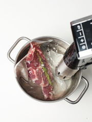 Sous vide cooking in pot  - 251643993
