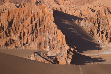 View of the landscape of rocks of the Mars Valley (Valle de Marte) and Cordillera de la Sal, Atacama Desert, Chile