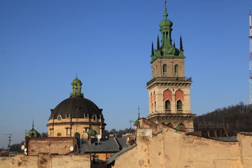Fototapeta na wymiar Lviv / Ukraine - 01.01.2019: Lviv rooftops a view from House of Legend