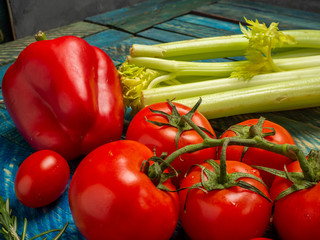 Bright vegetables on wooden background