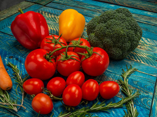 Bright vegetables on wooden background