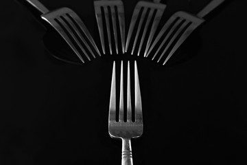 silverware utensils with knife fork and spoons on a table