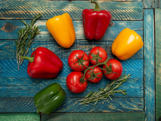 Bright vegetables on wooden background