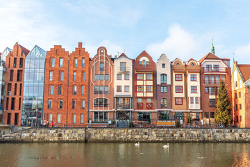 Beautiful facades of the buildings in Gdansk by the river, Poland
