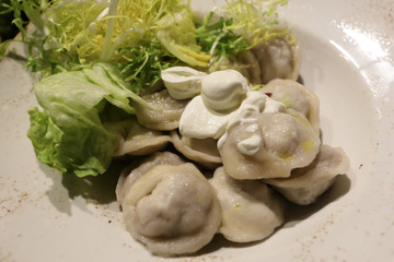 Russian dumplings with sour cream