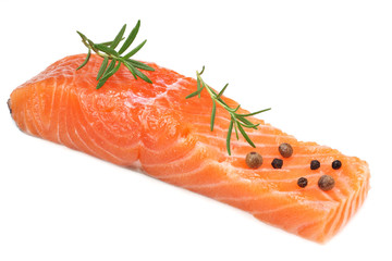 Red fish. Raw salmon fillet with rosemary isolate on white background.