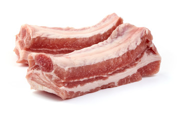 Obraz premium Raw fresh pork ribs, close-up, isolated on white background