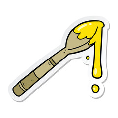 sticker of a cartoon spoonful of honey