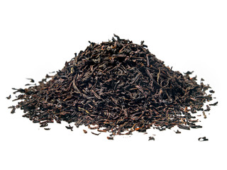 Heap of black tea on white background. Close up. High resolution.