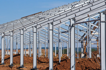 The structure of the building. Steel construction on the sky background. Electroplate steel metal. Zinc metal coating to protect against corrosion.
