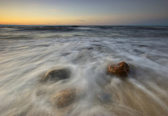 Sunset by the sea in summer