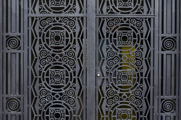 Old black metal door background