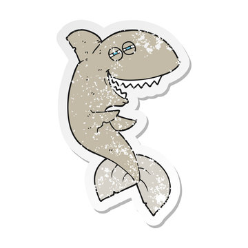 retro distressed sticker of a cartoon laughing shark