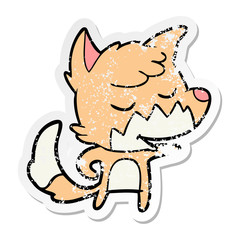 distressed sticker of a friendly cartoon fox