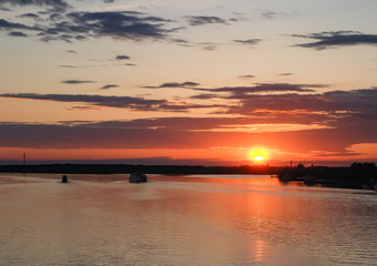 Fototapeta na wymiar river Volga and a lagre ship, beautiful sunset