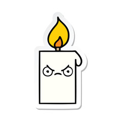 sticker of a cute cartoon lit candle