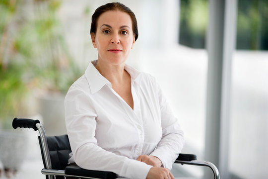 Portrait of senior woman in a wheelchair.