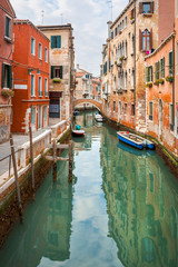 Obraz na płótnie Canvas Canal and historic buildings in Venice, Italy