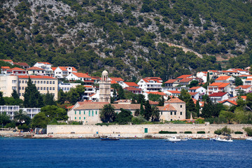 Fototapeta na wymiar Traditional Mediterranean architecture in town Hvar, on island Hvar, Croatia. Hvar is popular summer travel destination.