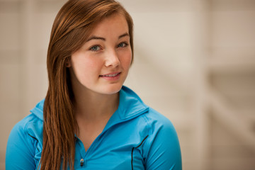 Portrait of a teenage girl with long brown hair.