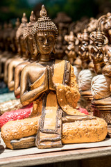 Buddha statue figures sold as a souvenir on a market