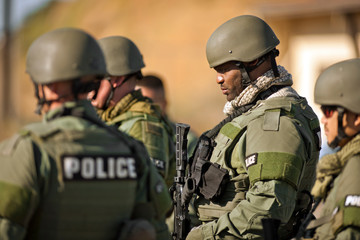 Group of police officers at a training facility.