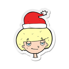 sticker of a cartoon boy in santa hat