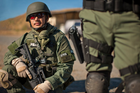 Male police officer at a training facility.