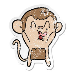 distressed sticker of a crazy cartoon monkey