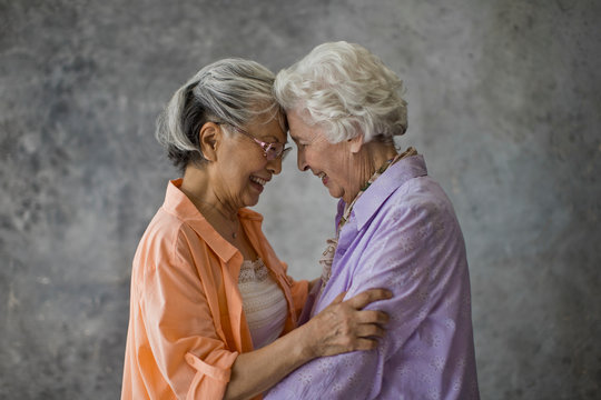 Side View Of Smiling Senior Women