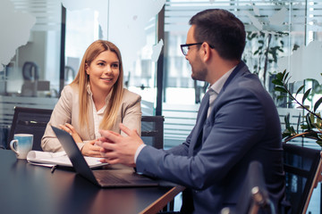 Business partners working in office