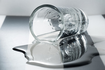 The poured vodka. The overturned glass of vodka