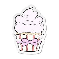 distressed sticker of a cartoon fancy cupcake